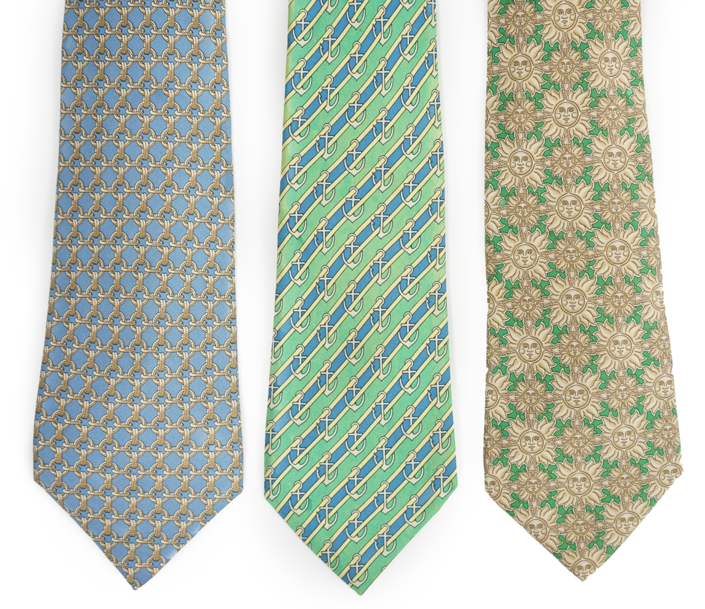 Three Hermès gentlemen's assorted patterned silk ties